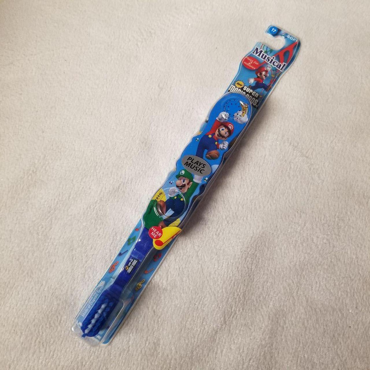 Mario toothbrush Era 2007 New in package. Says it... Depop