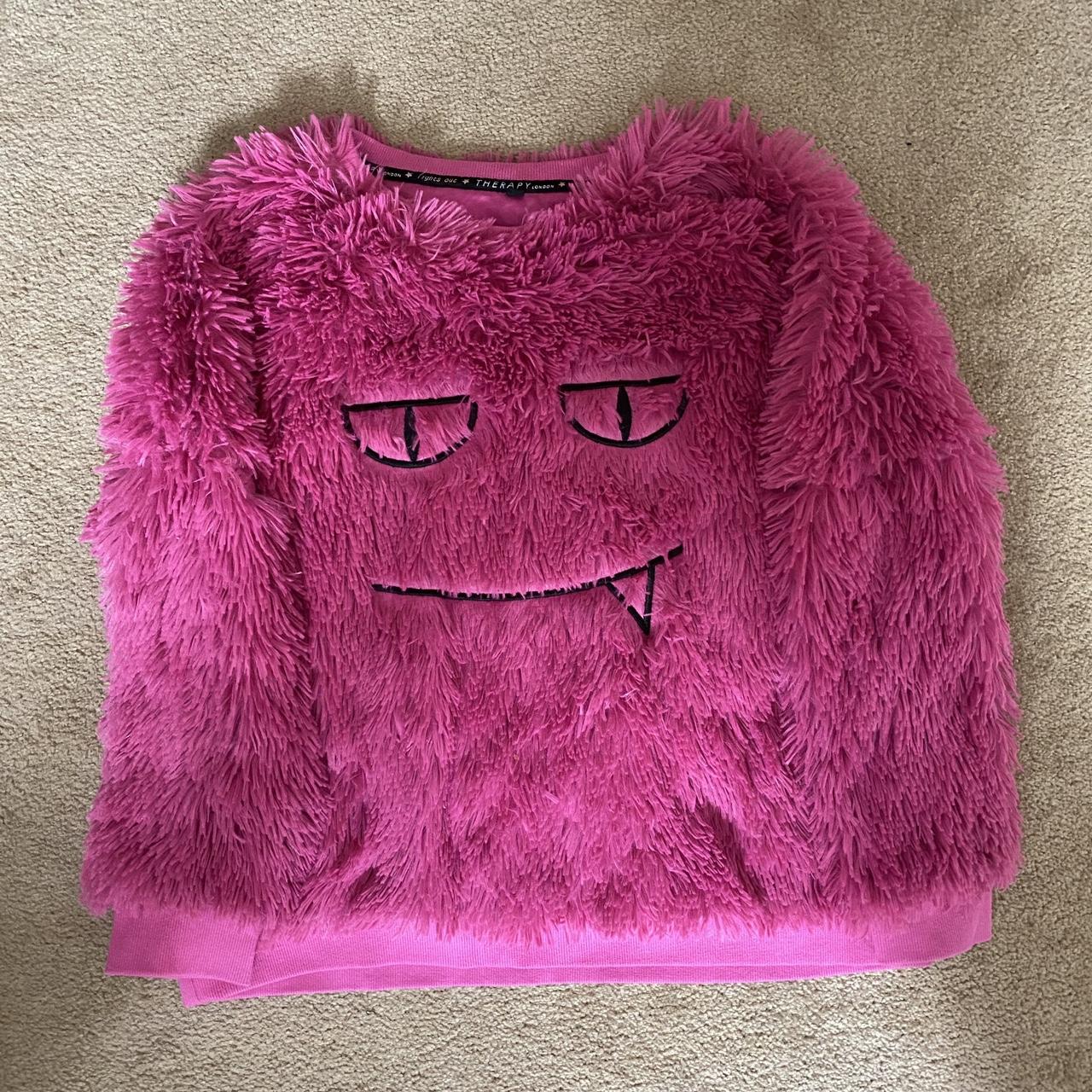 Pink fluffy monster jumper in size M from Depop