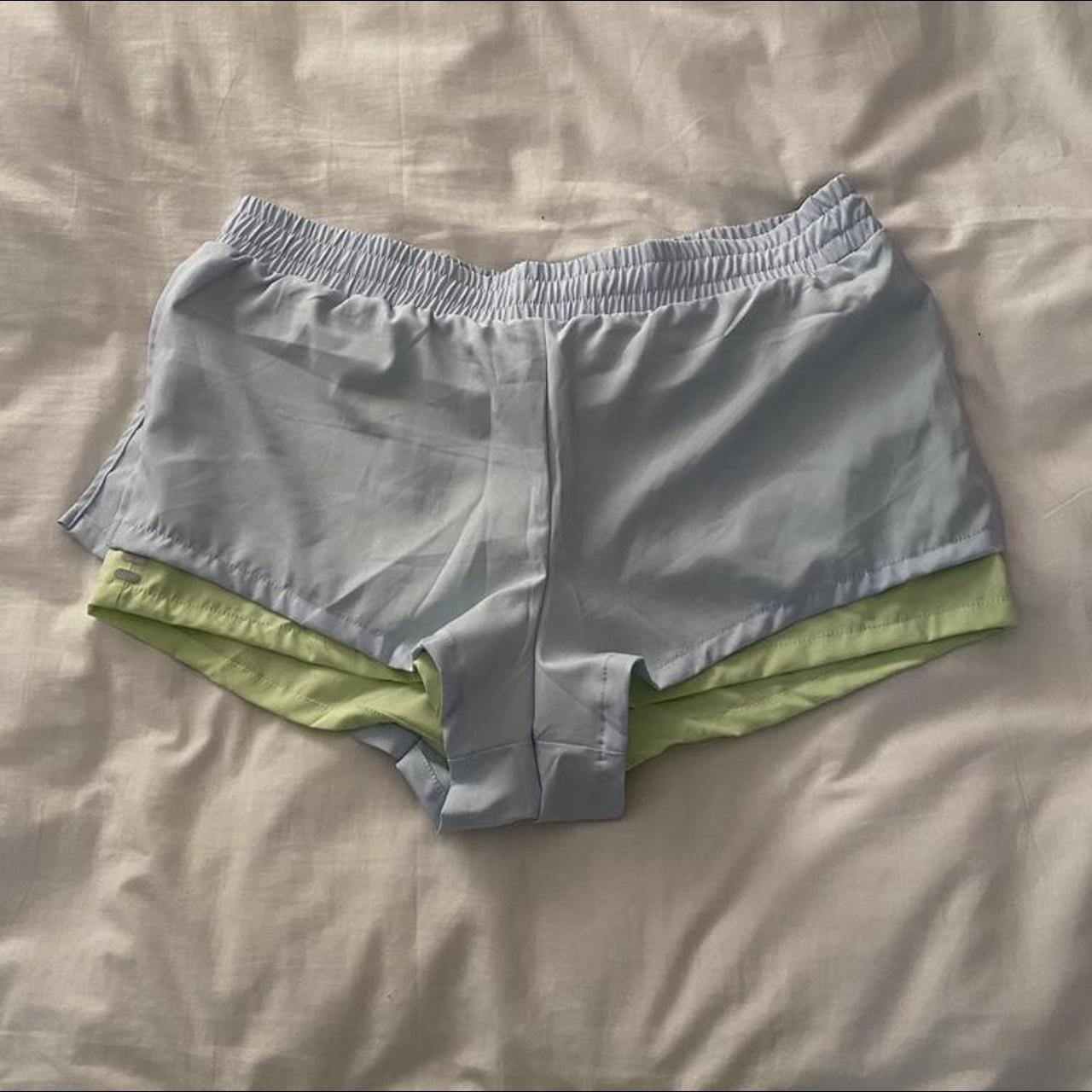 Blue and green hind running shorts, brand new and... - Depop
