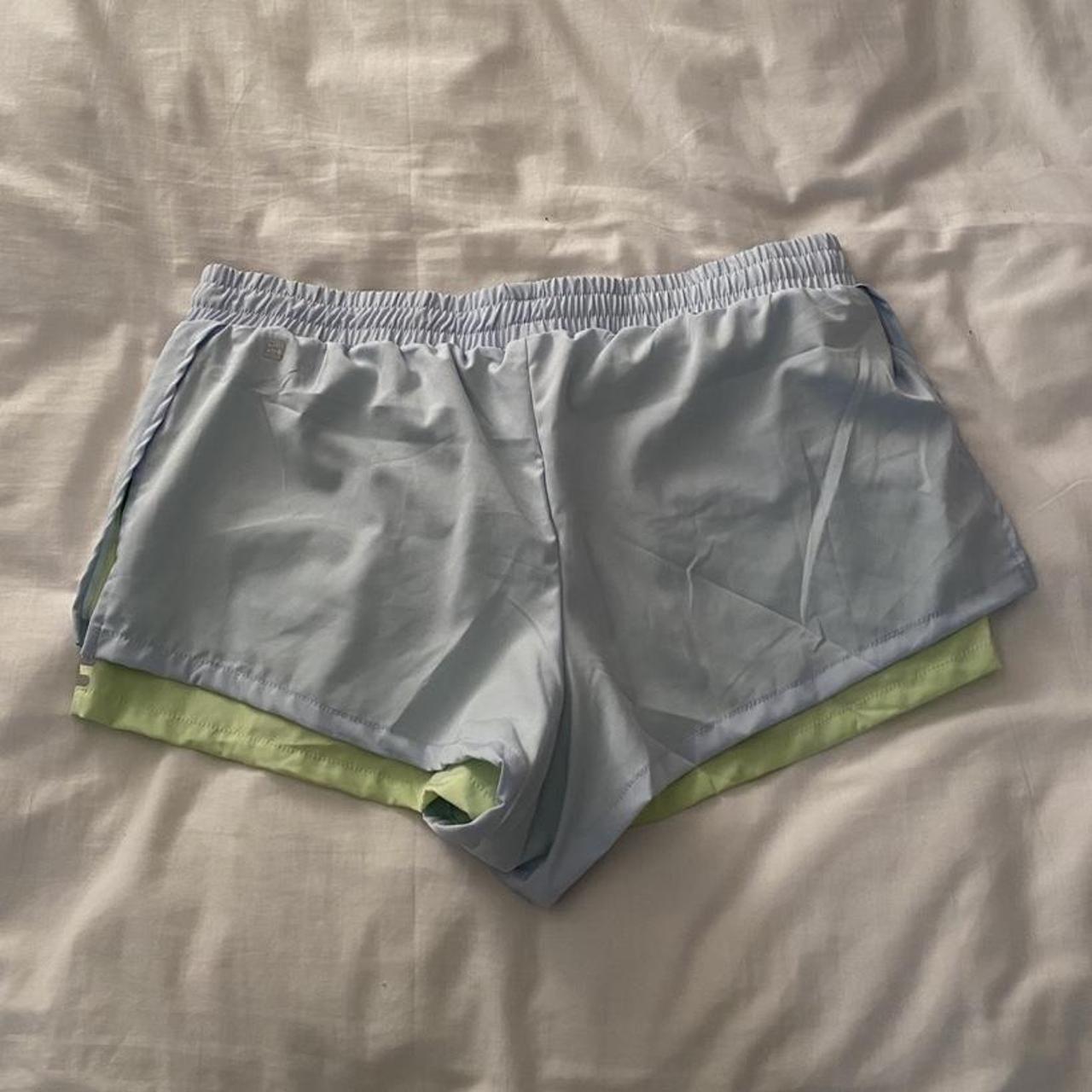 Blue and green hind running shorts, brand new and... - Depop