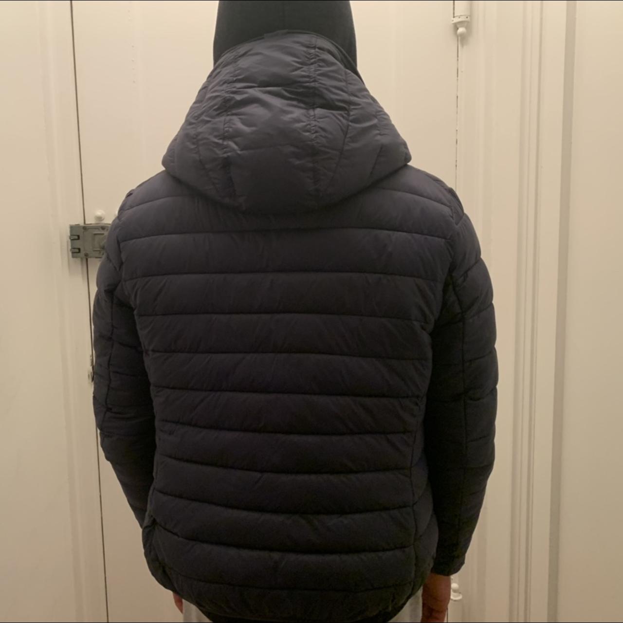 Hooded navy puffer jacket lined on the inside with... - Depop