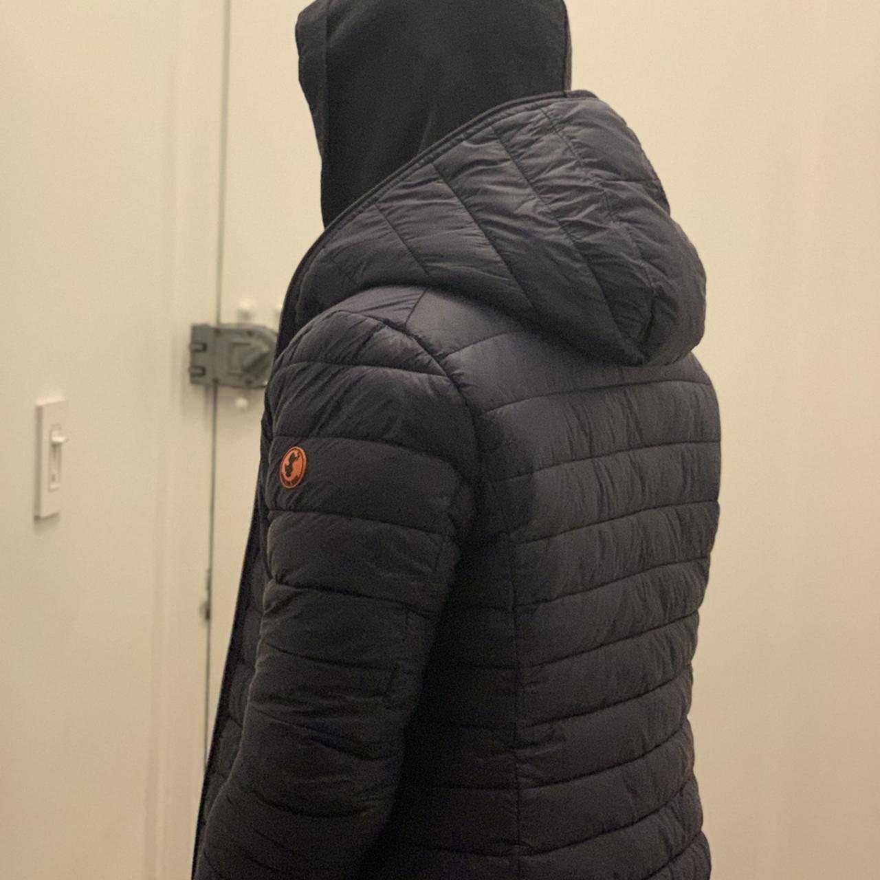 Hooded navy puffer jacket lined on the inside with... - Depop