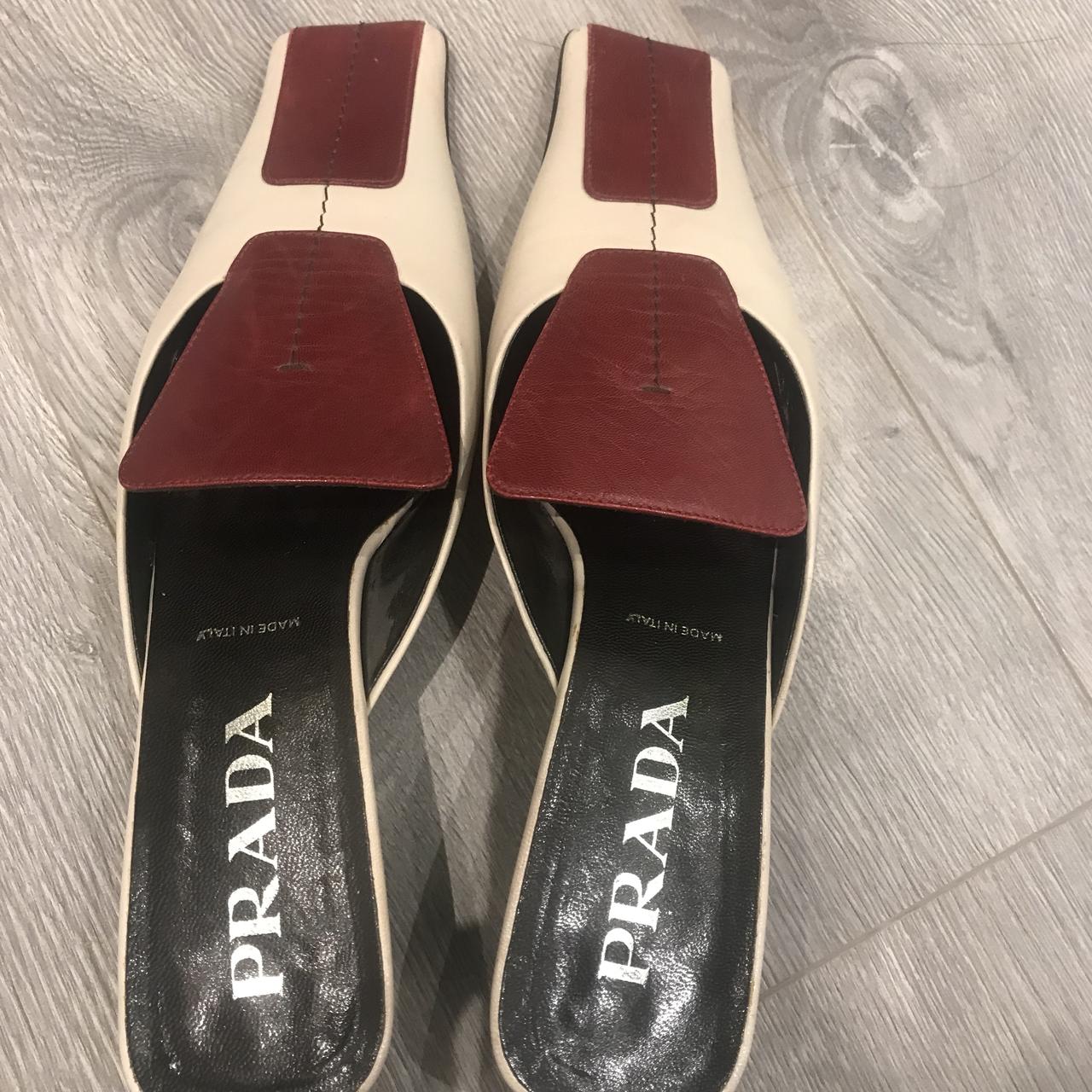 Prada mules in great condition just one scuff on the - Depop