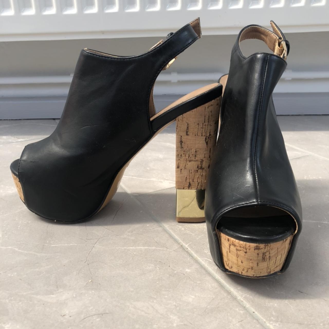 Platformed heels with golden detail. Worn a couple... - Depop