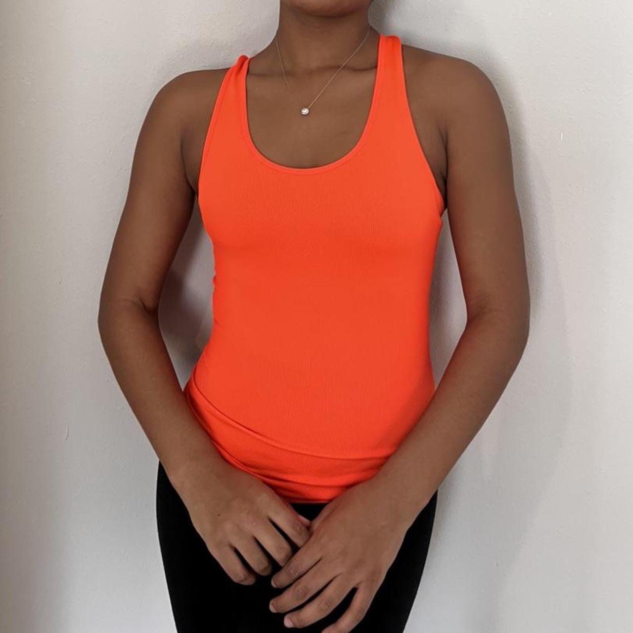 Nothing can go wrong with this neon orange tank top!... - Depop