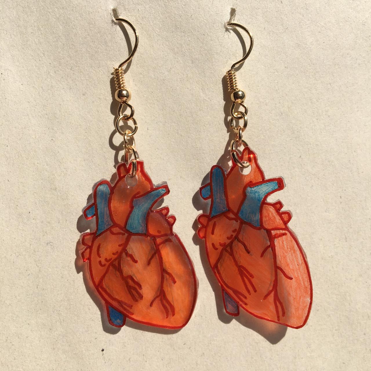 Human heart deals earrings