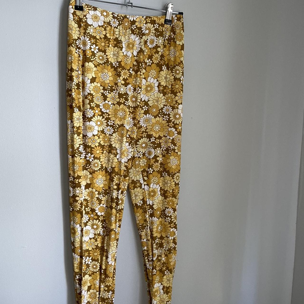 Ghanda clothing yellow floral flare pants. Worn a... - Depop