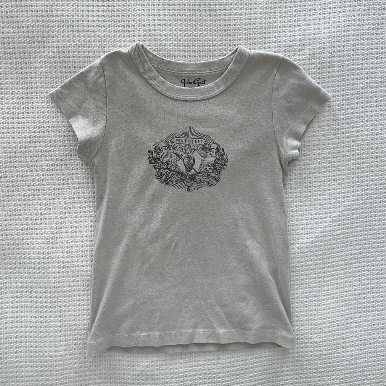 the cutest brandy baby tee! this top is a greyish... Depop