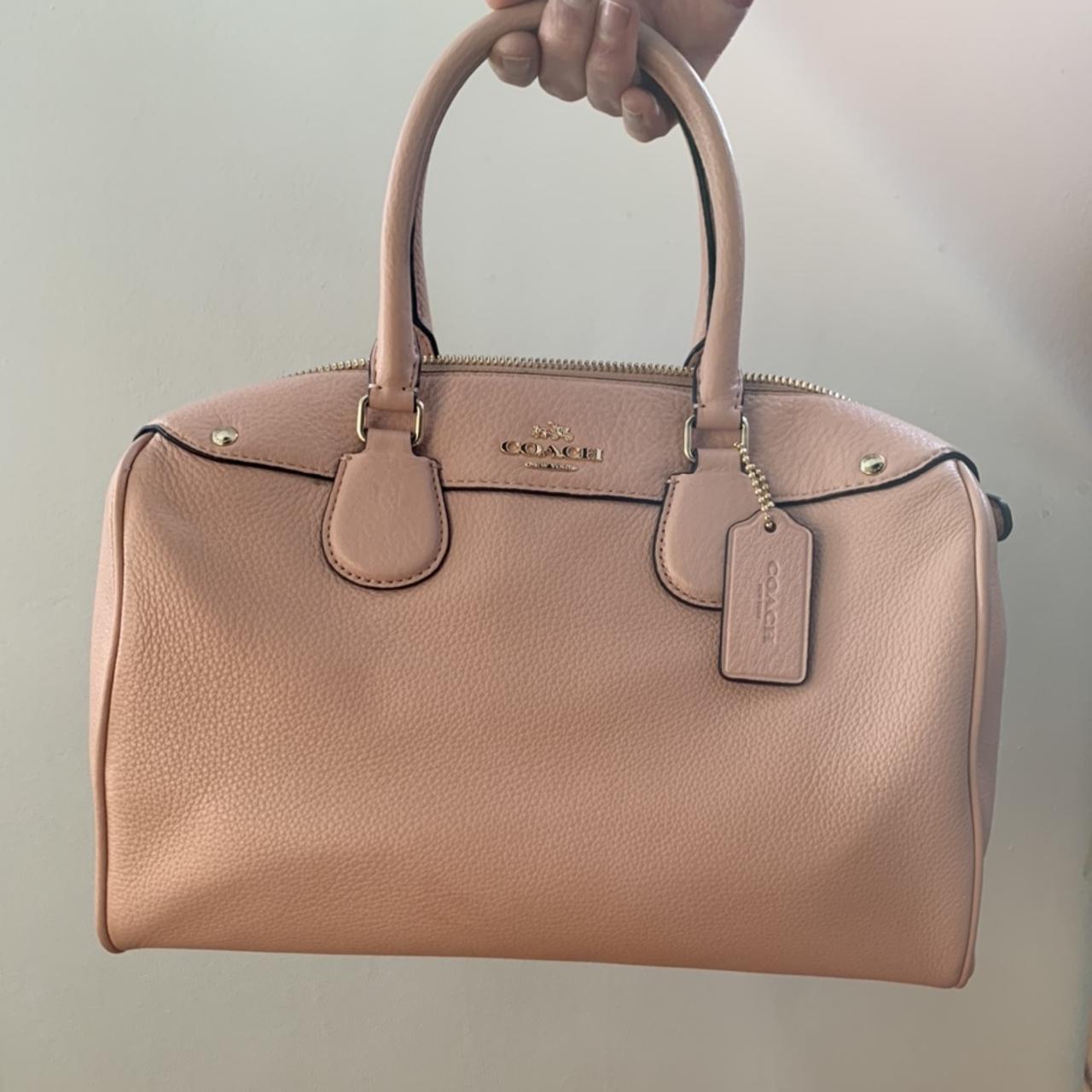 Coach purse a lovely pale pink color this bag