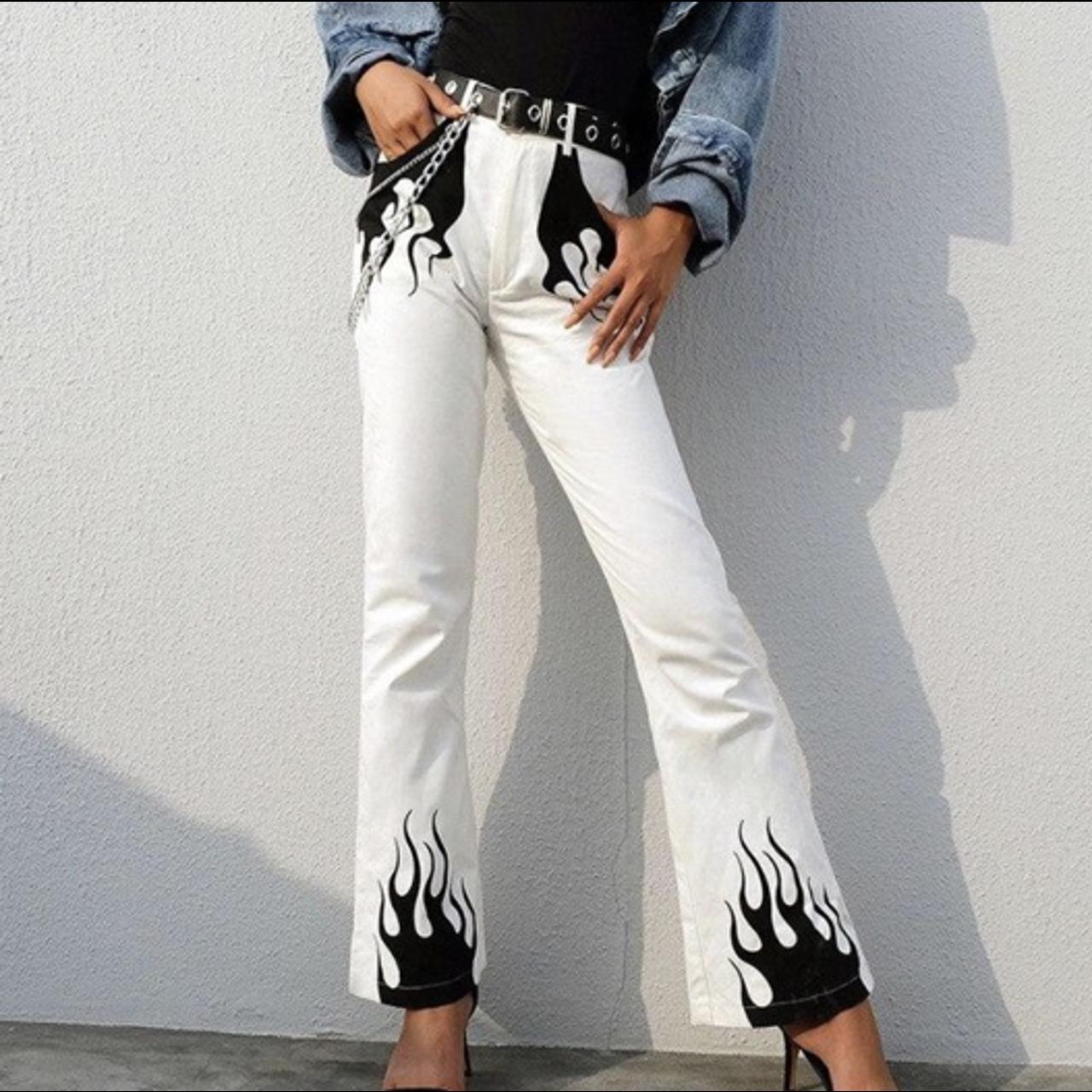 black jeans with white flames