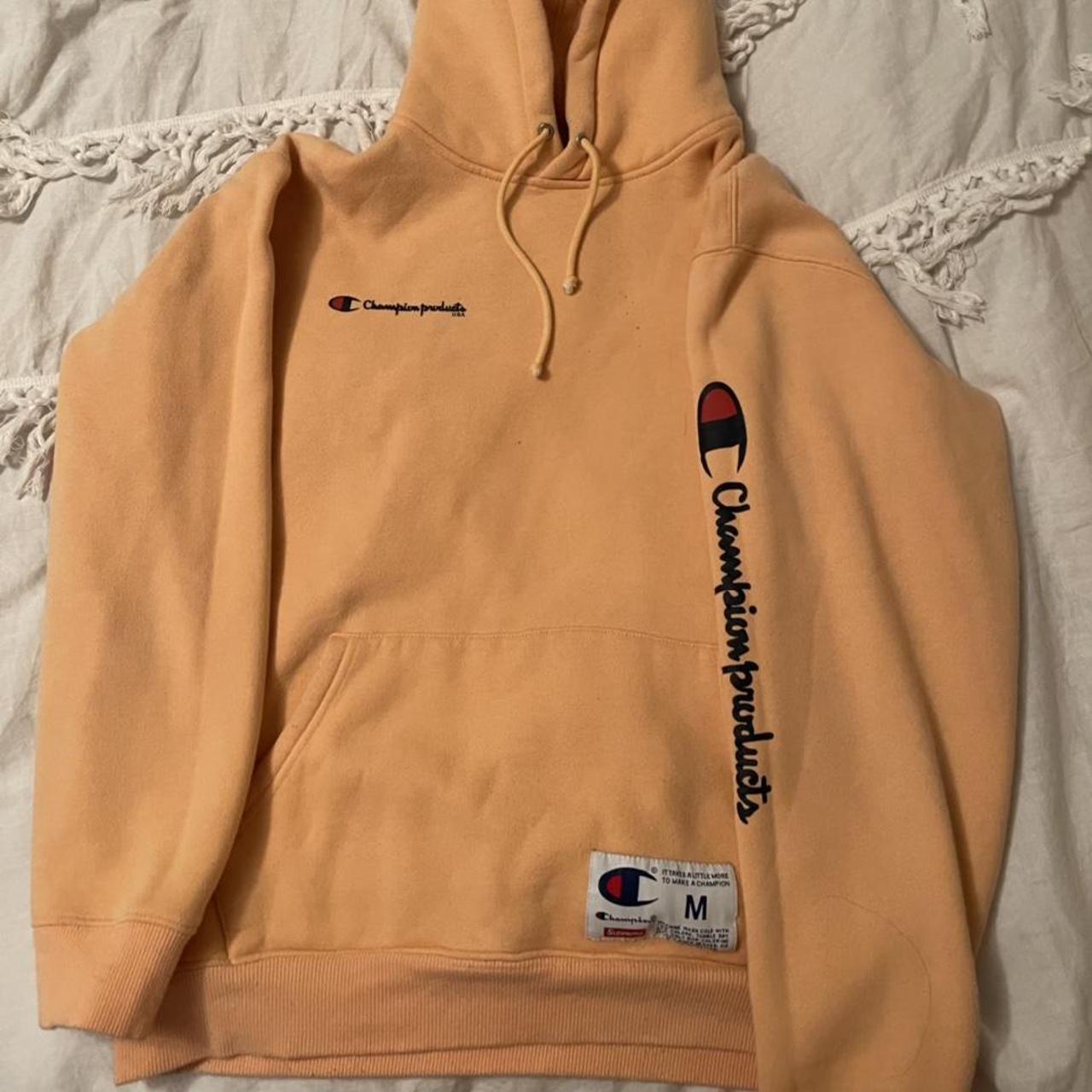 Supreme champion outlet peach hoodie