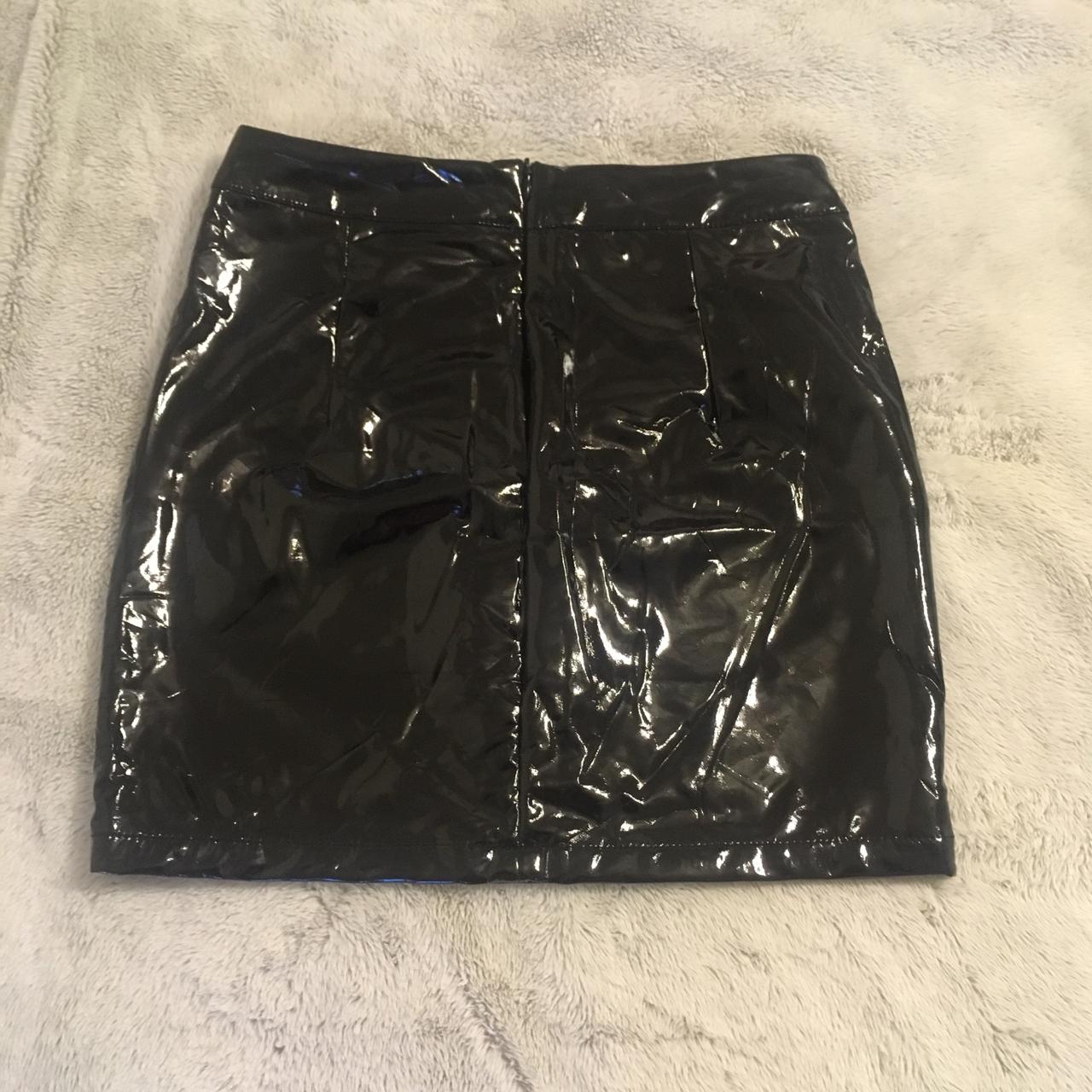 Cute little black pleather skirt perfect for a show... - Depop