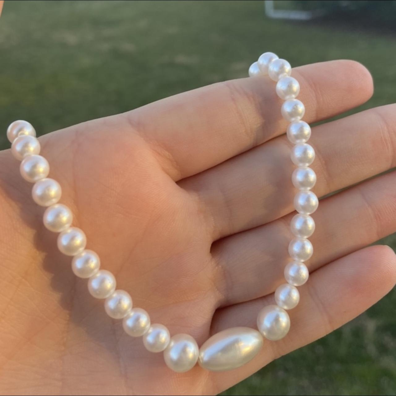 Looking for long Chanel CC pearl necklace in either - Depop