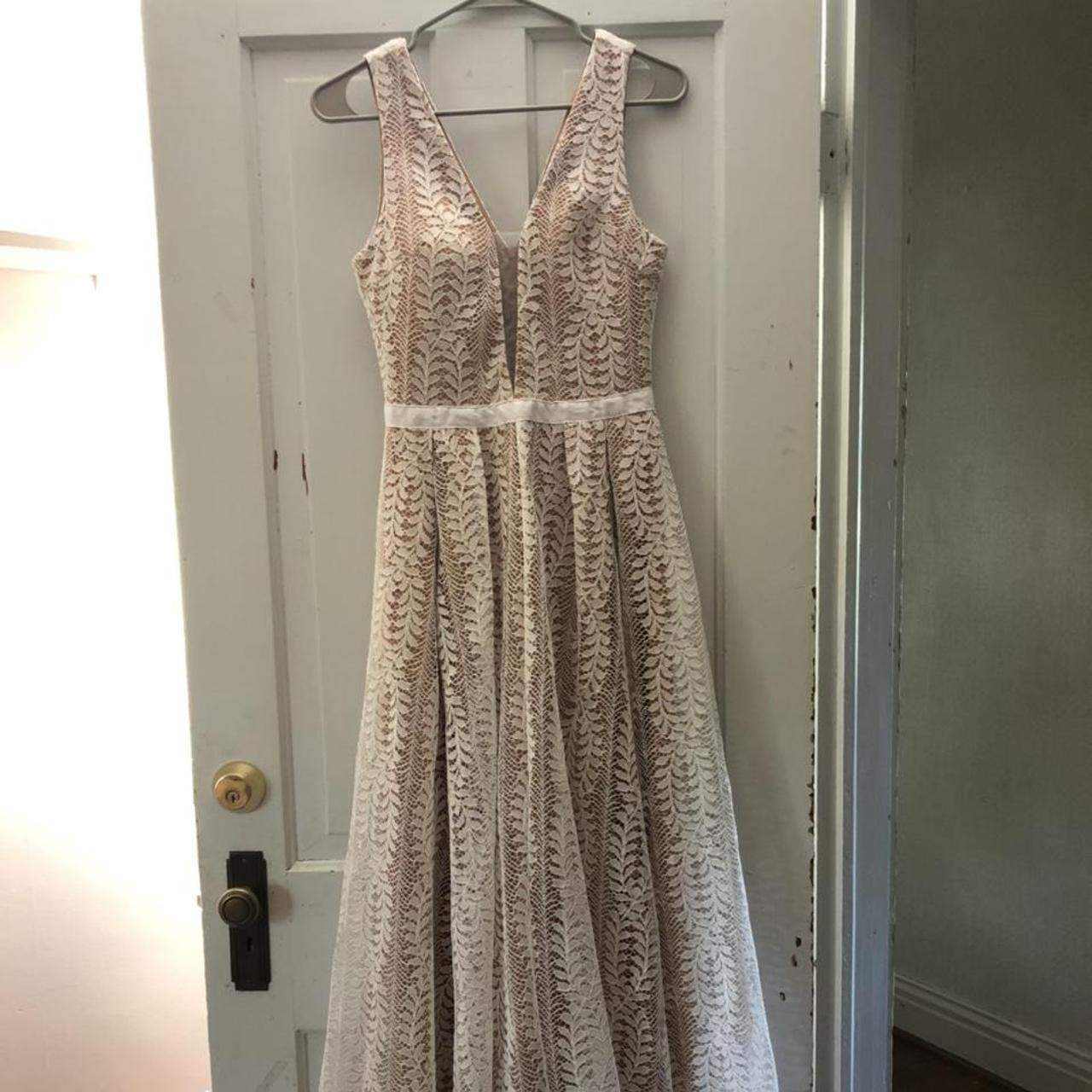 White lace with a nude inner lining. Size small.... - Depop