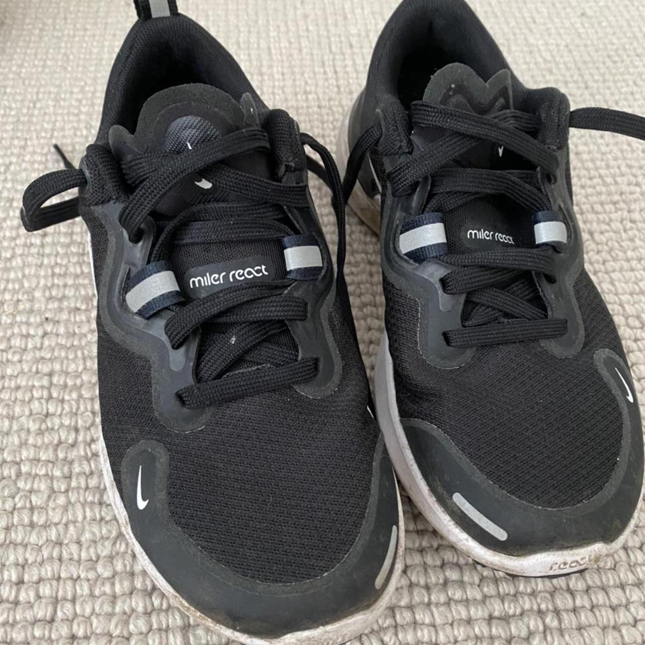 mens black and white nike react