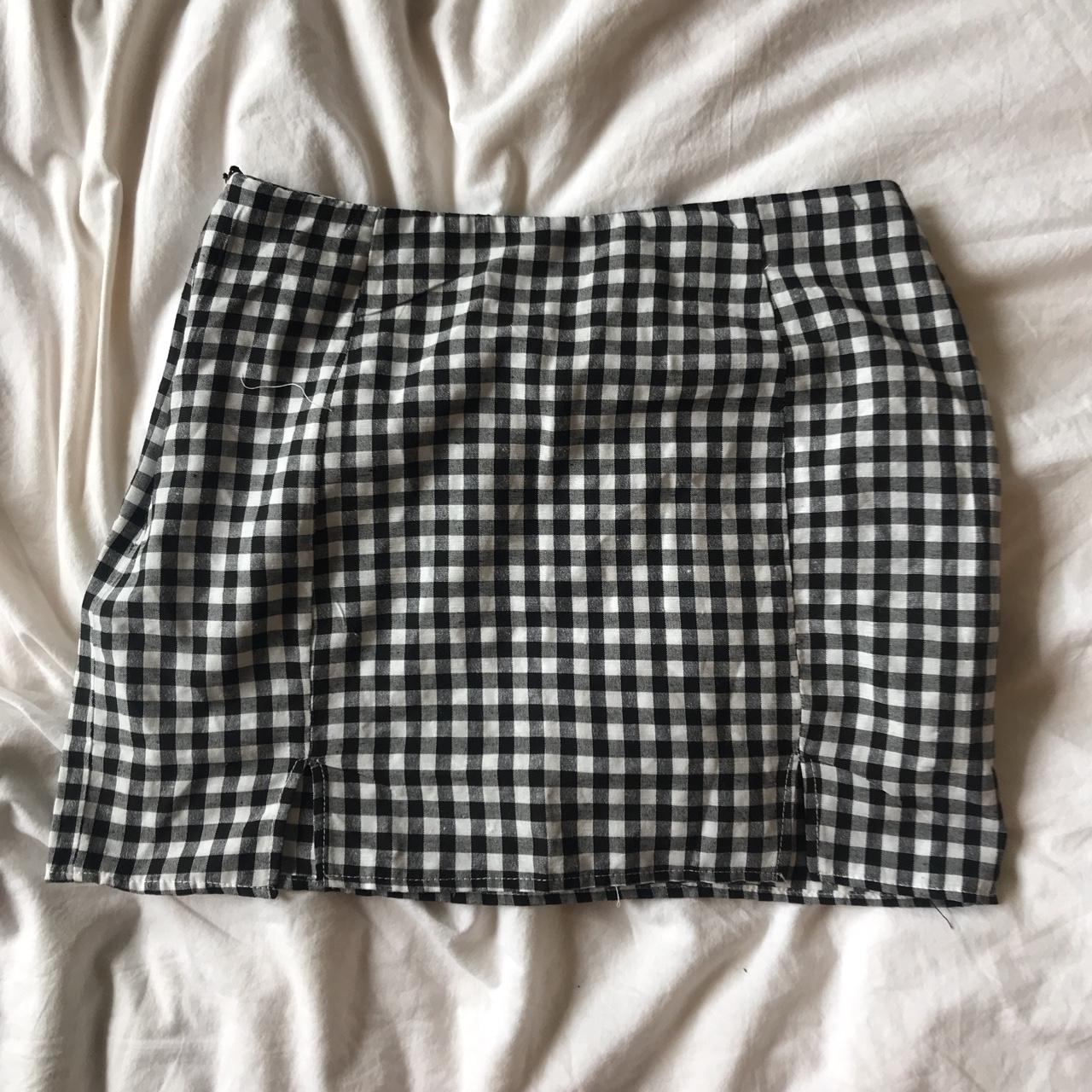 checkered black and white mini skirt with slits so... - Depop