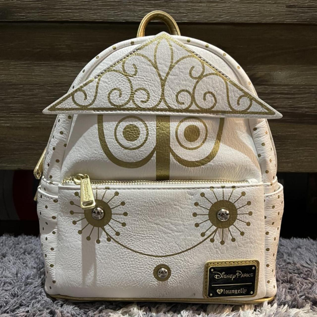 loungefly it's a small world backpack