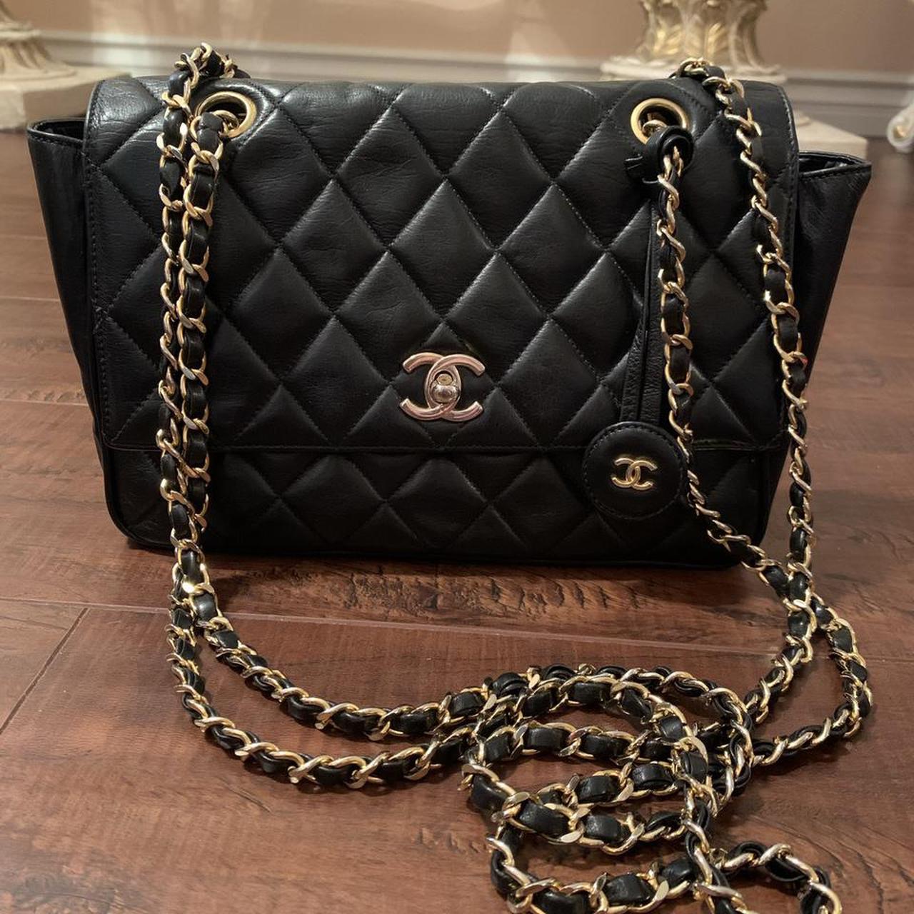 Chanel Women's Black and Gold Bag | Depop