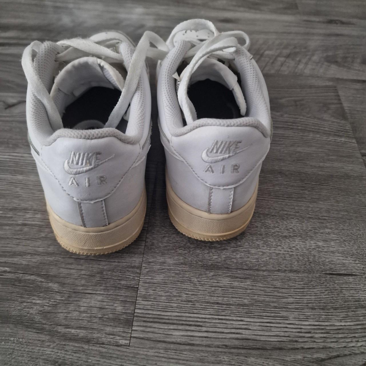 creased air force 1s