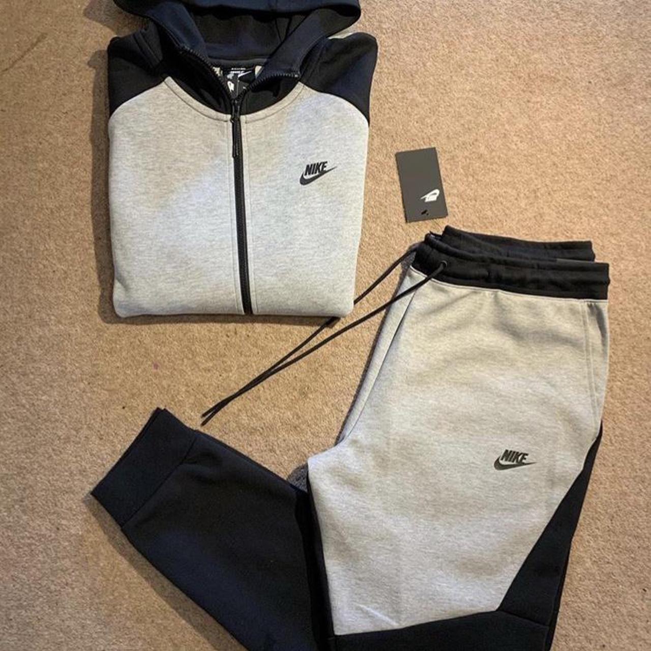 black and grey old season tech fleece