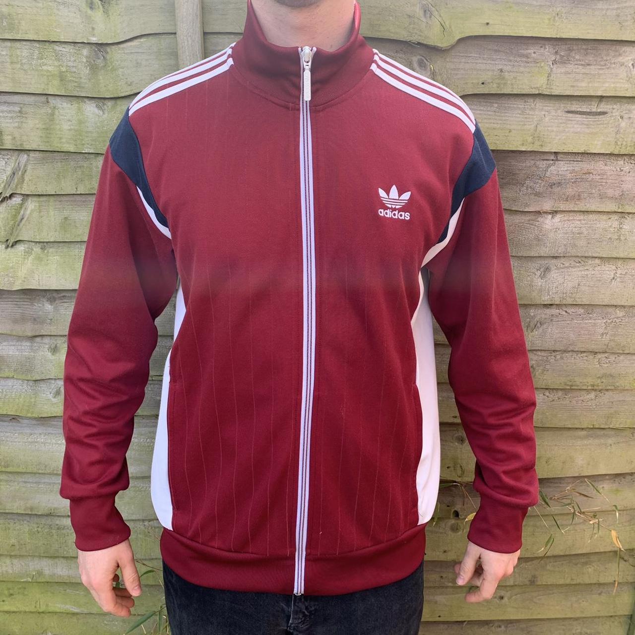 Adidas track jacket Burgundy with white accents... Depop