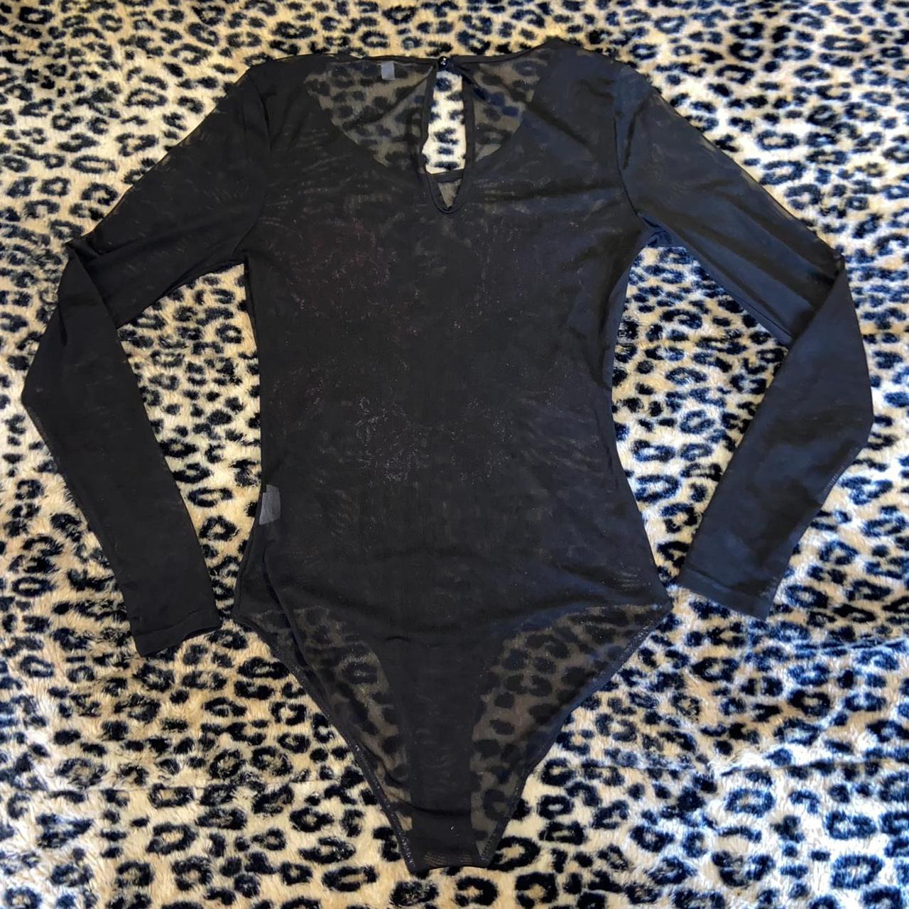 black mesh bodysuit with floral patches from... - Depop