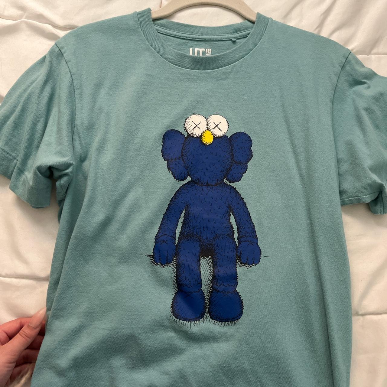 kaws baby blue uniqlo tee in a size xs !! can... - Depop