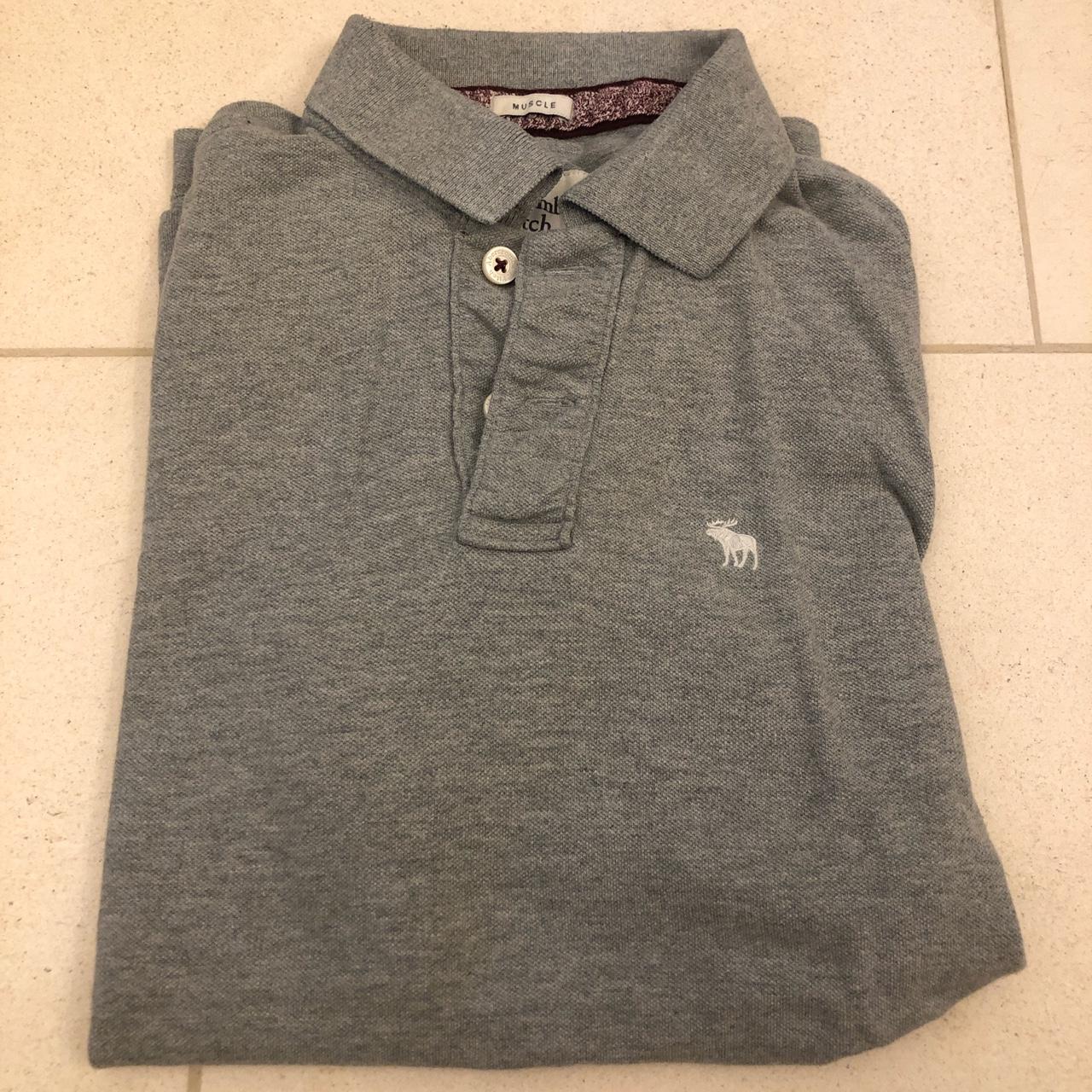 Abercrombie and Fitch grey muscle fit polo shirt... - Depop