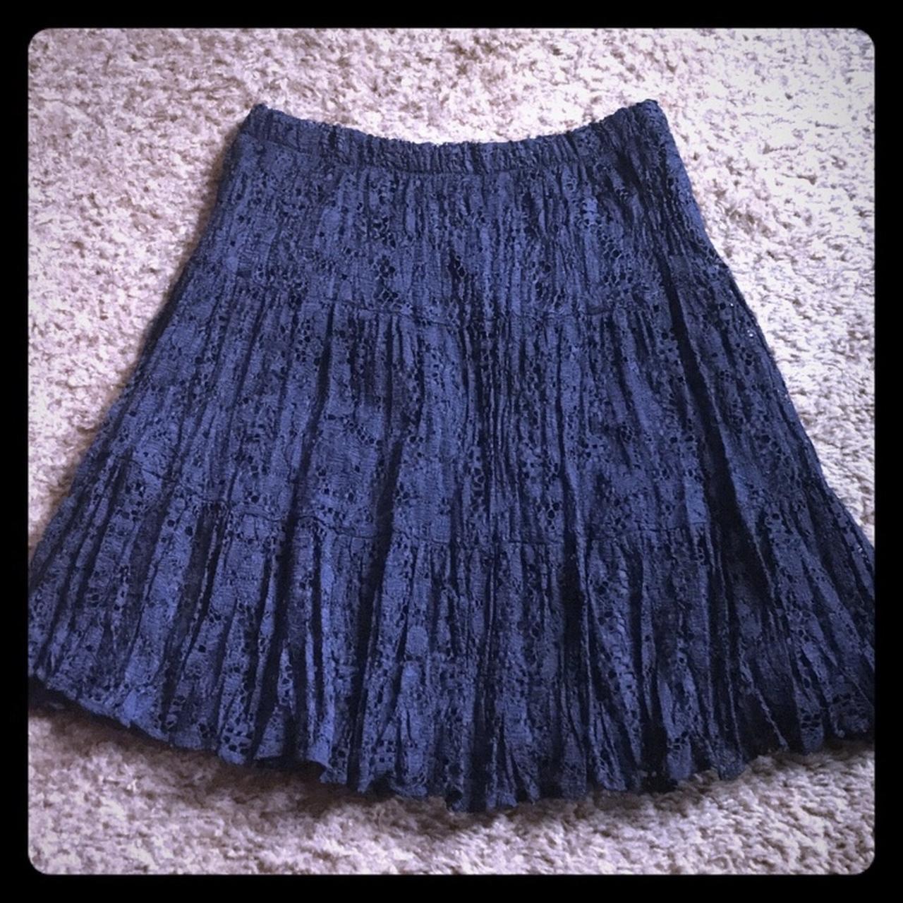 Black lace knee length skirt. Tag says girls 12,... - Depop