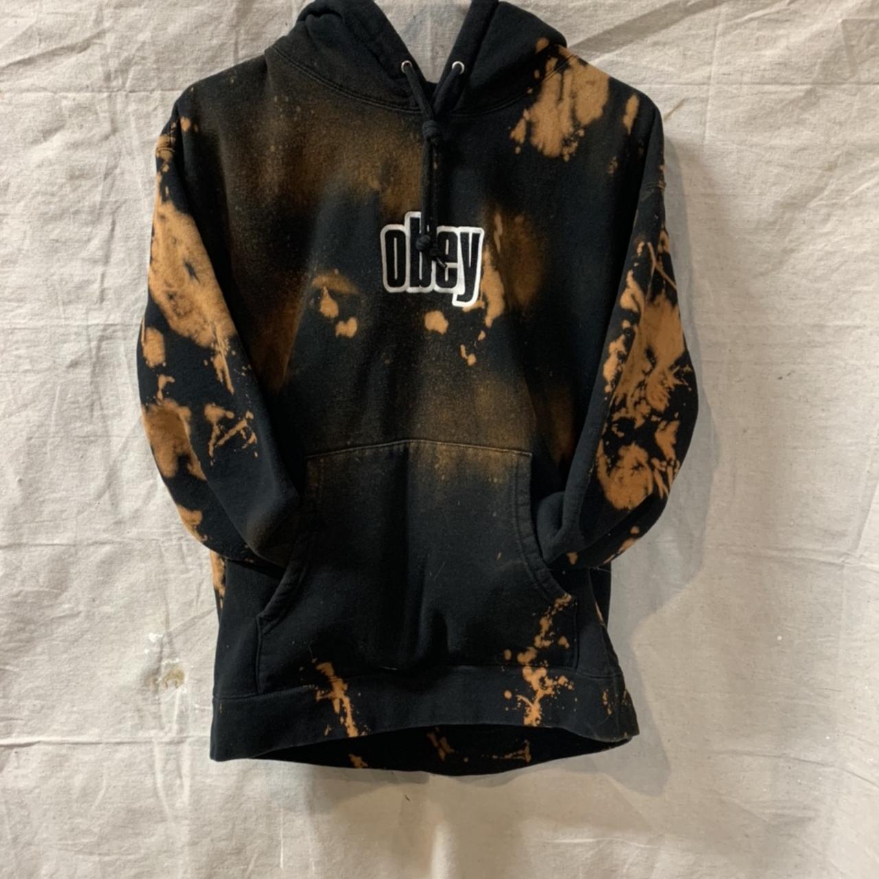 Bleached Black Obey hoodie with embroidered logo