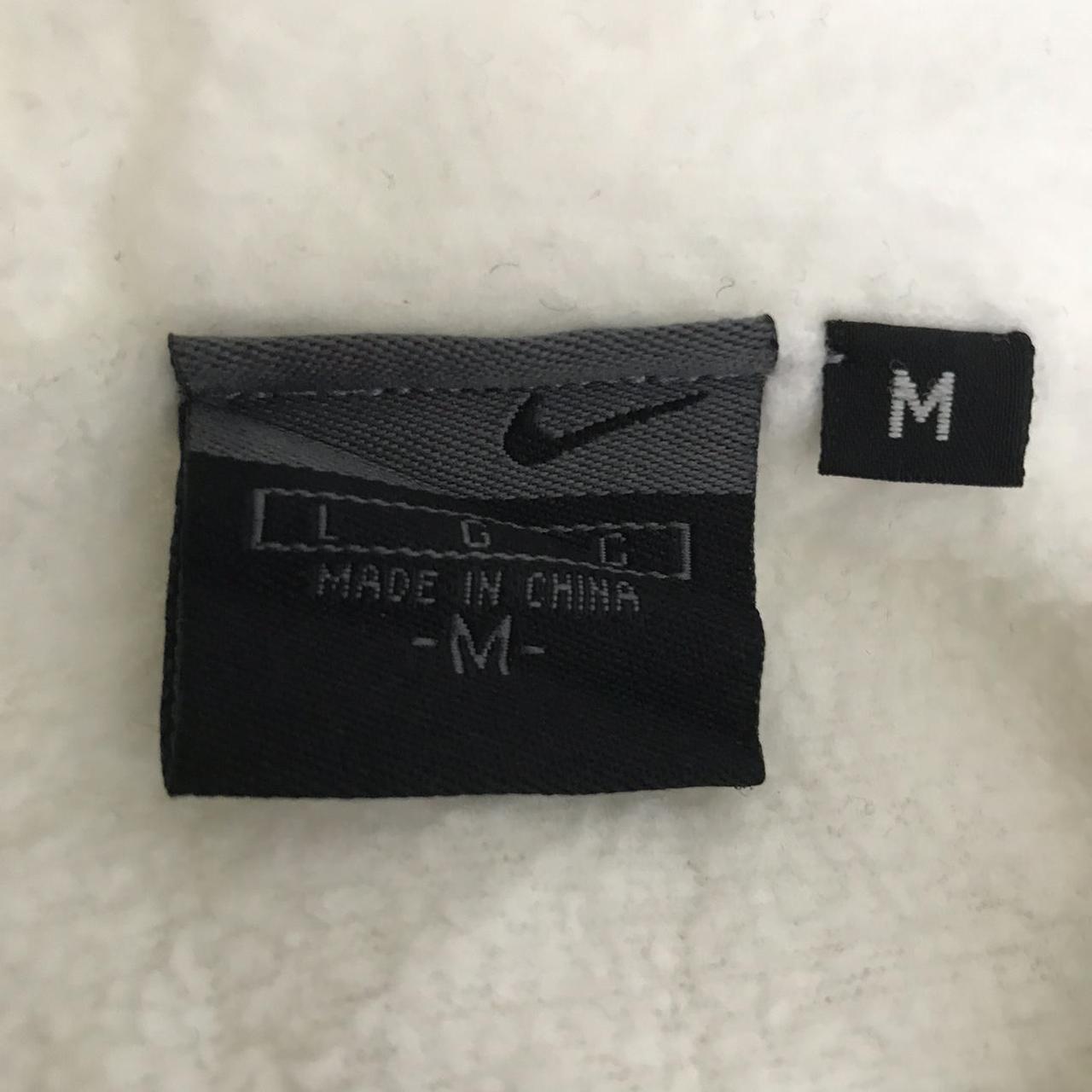 nike swoosh tape track