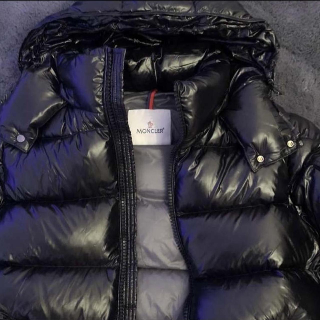 Moncler maya size 3 good condition Small hole on... - Depop