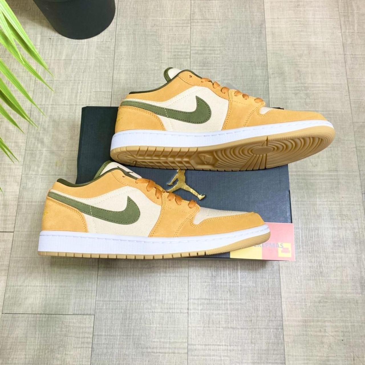 green and orange jordans