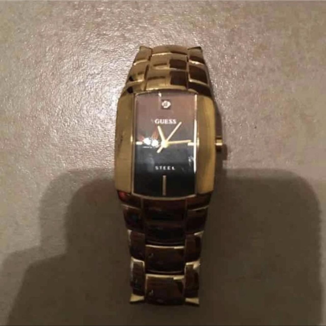 Guess watch made from steal with gold colored... - Depop