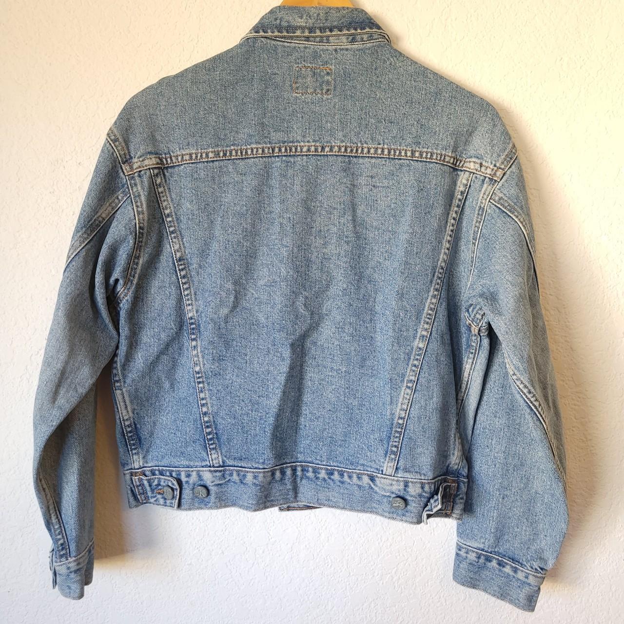 90s Calvin Klein denim jacket with a slightly... - Depop