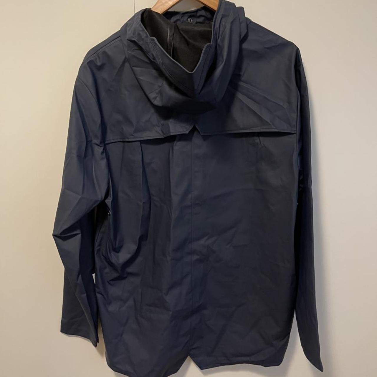Navy blue rain jacket by Rains, excellent condition... - Depop