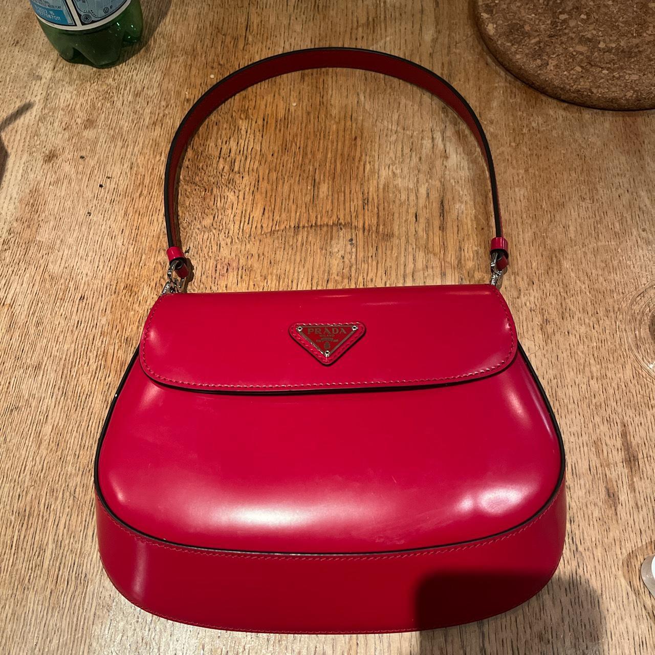 Prada Cleo brushed leather mini bag in scarlet red - Depop