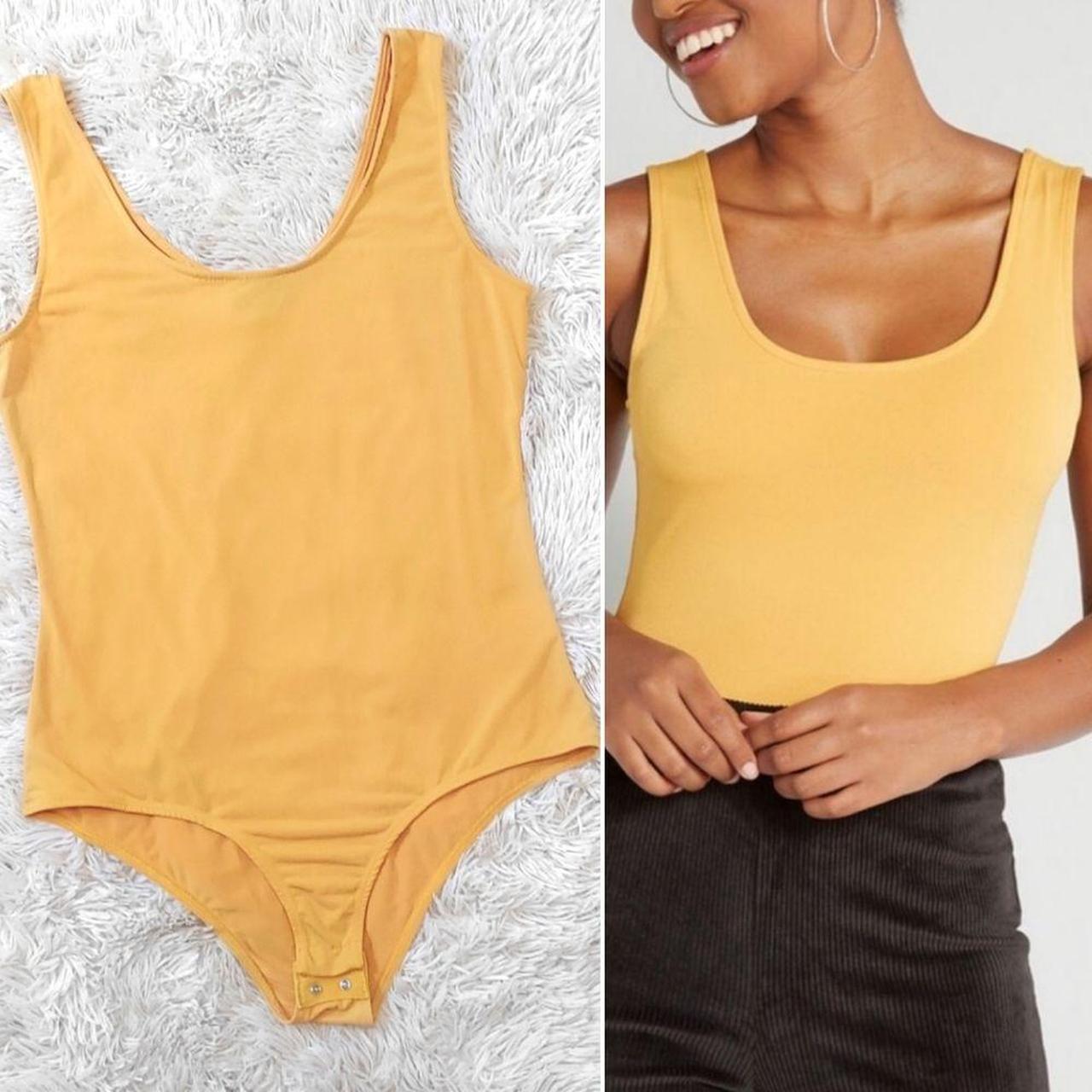 Product Image 1 - Modcloth bodysuit!

Mustard yellow.

Scoop neck front