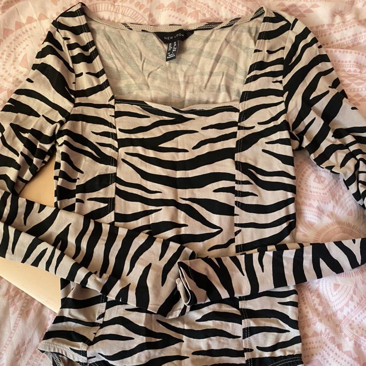 Zebra print nude and black bodysuit - Depop