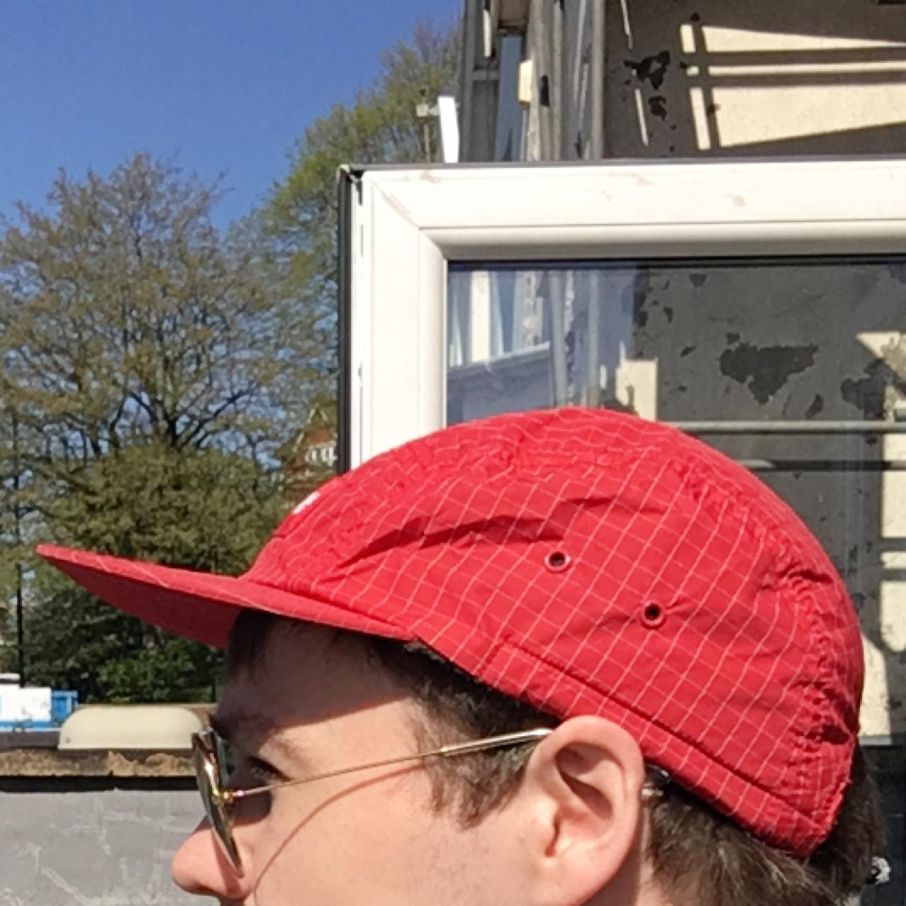 Supreme T-shirt and Red Camper Hat