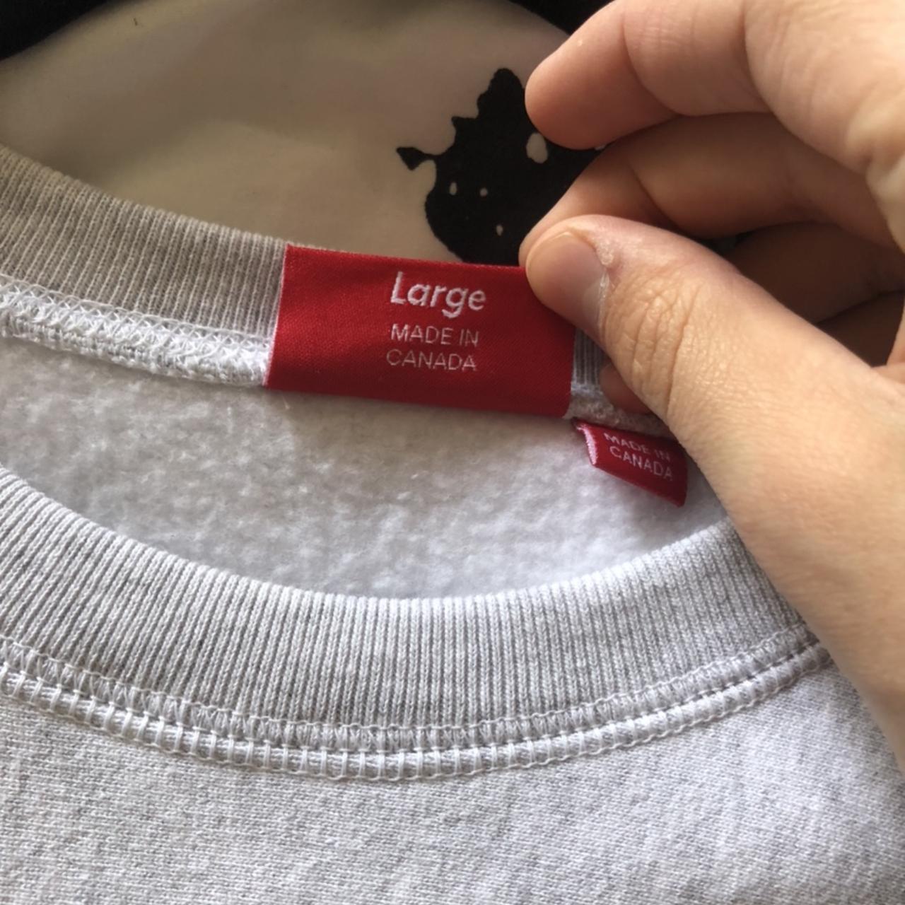 Supreme sweatshirt clearance tag