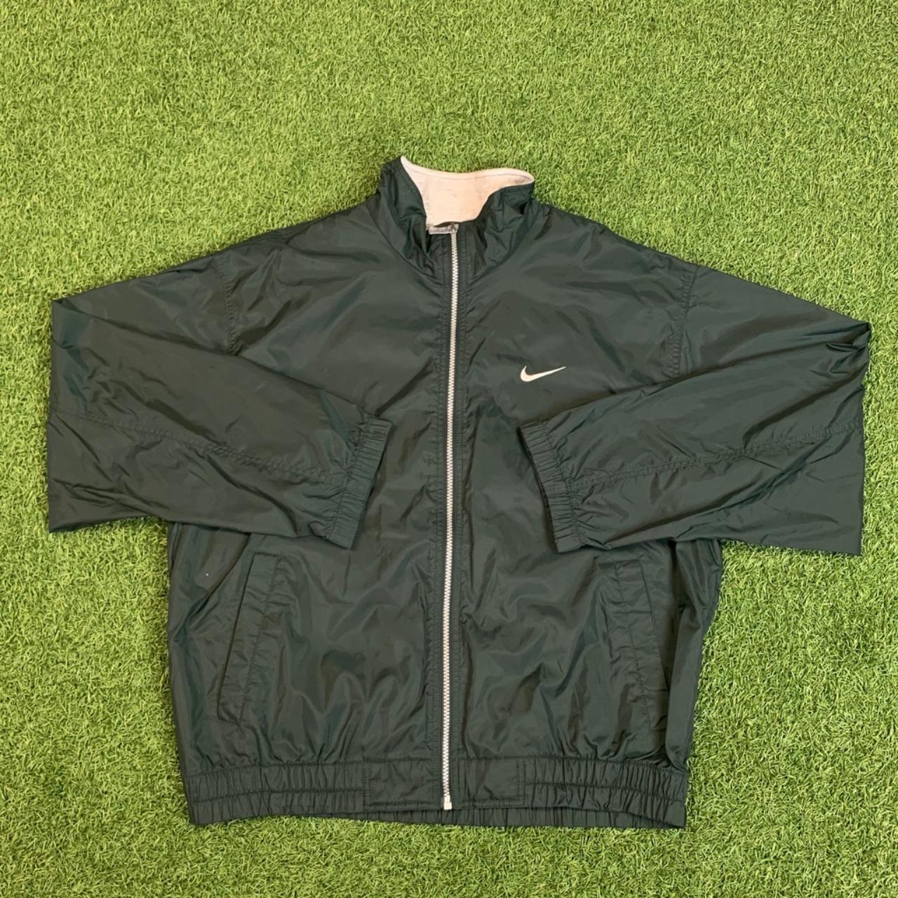 Dark green nike windbreaker best sale