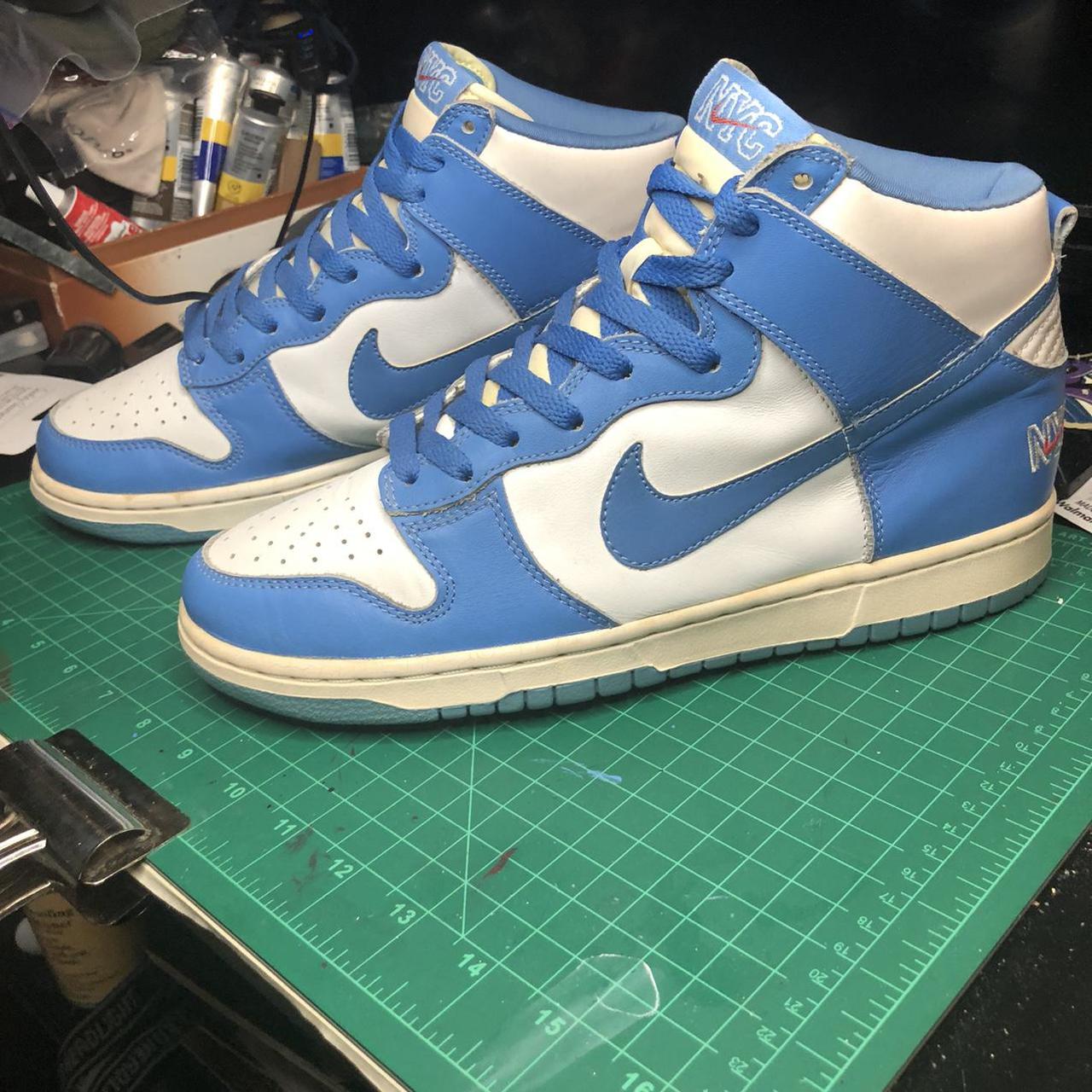 This is a pair of 1999 Nike Dunk High Le’s in the...