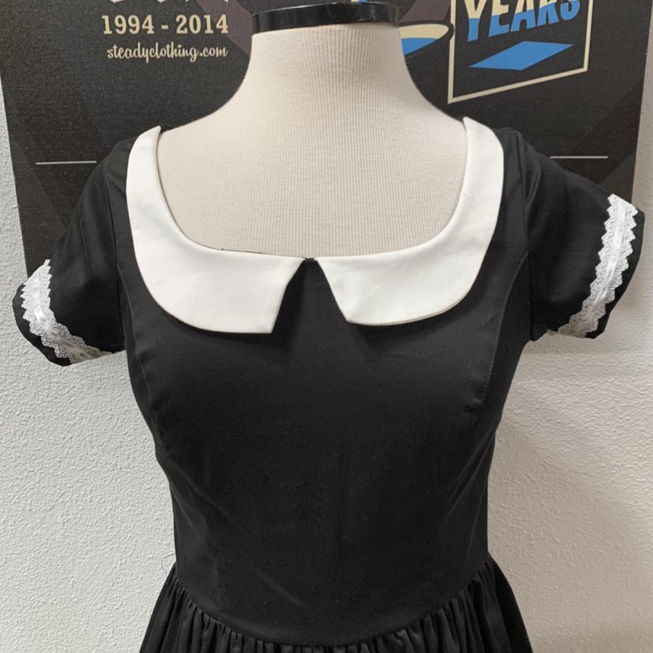 Women's black doll dress with white collar. The - Depop