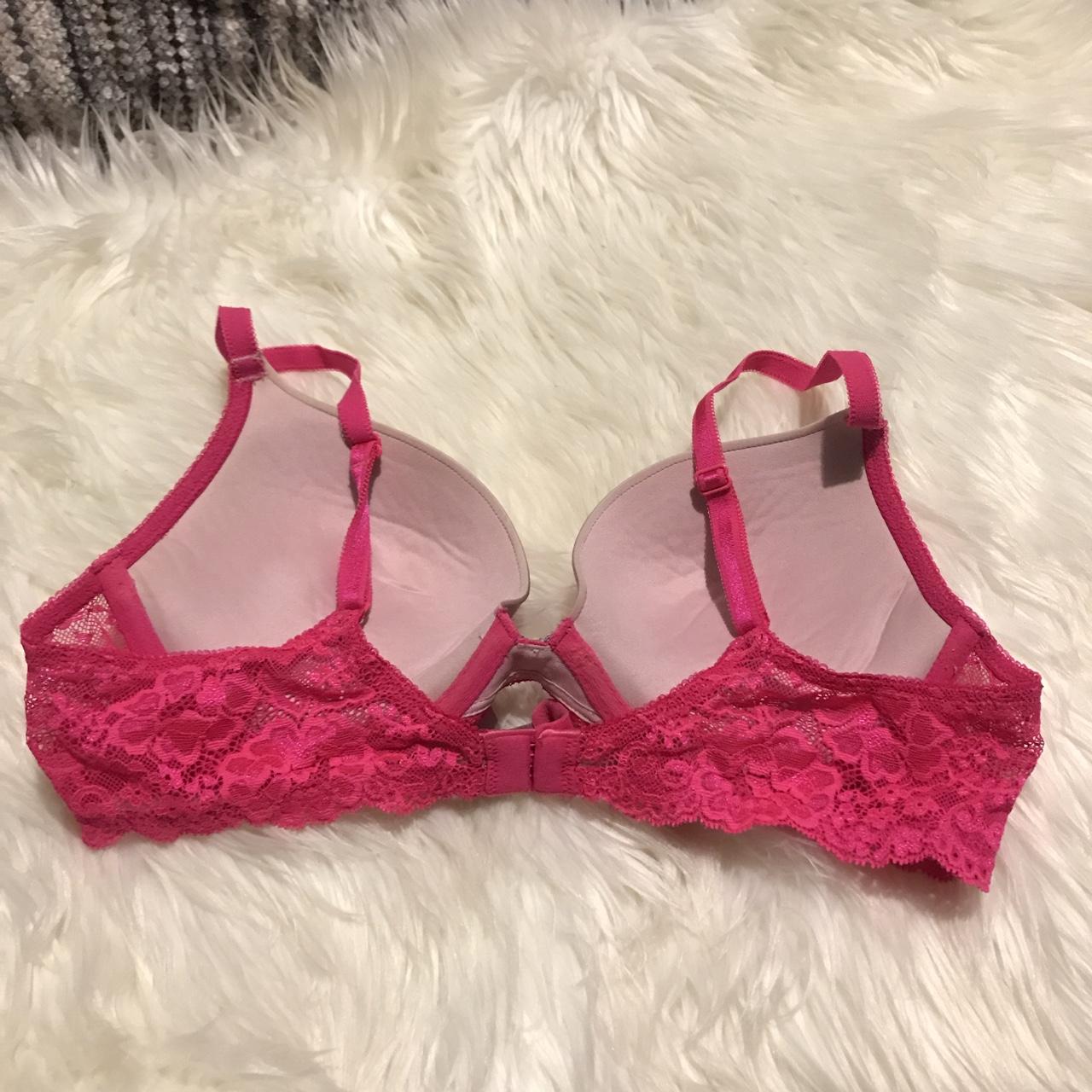 Victoria’s Secret hot pink rhinestone bra in the