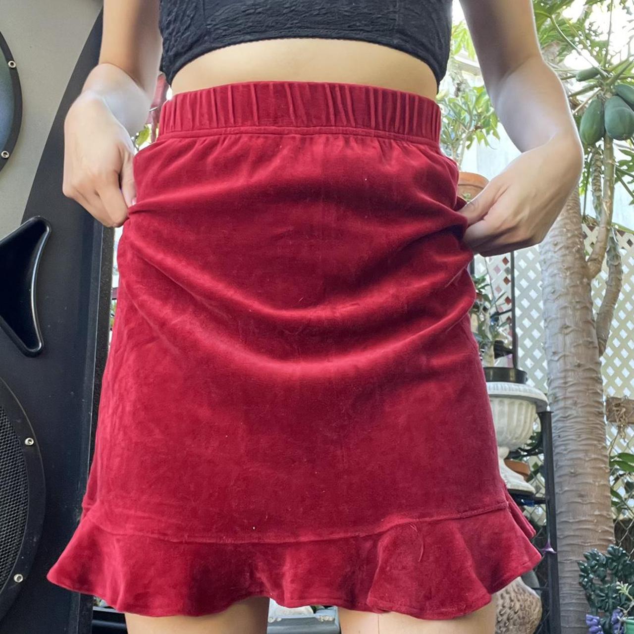 Red Velvet Skirt
 high waisted red velvet skirt with a stretchy Depop