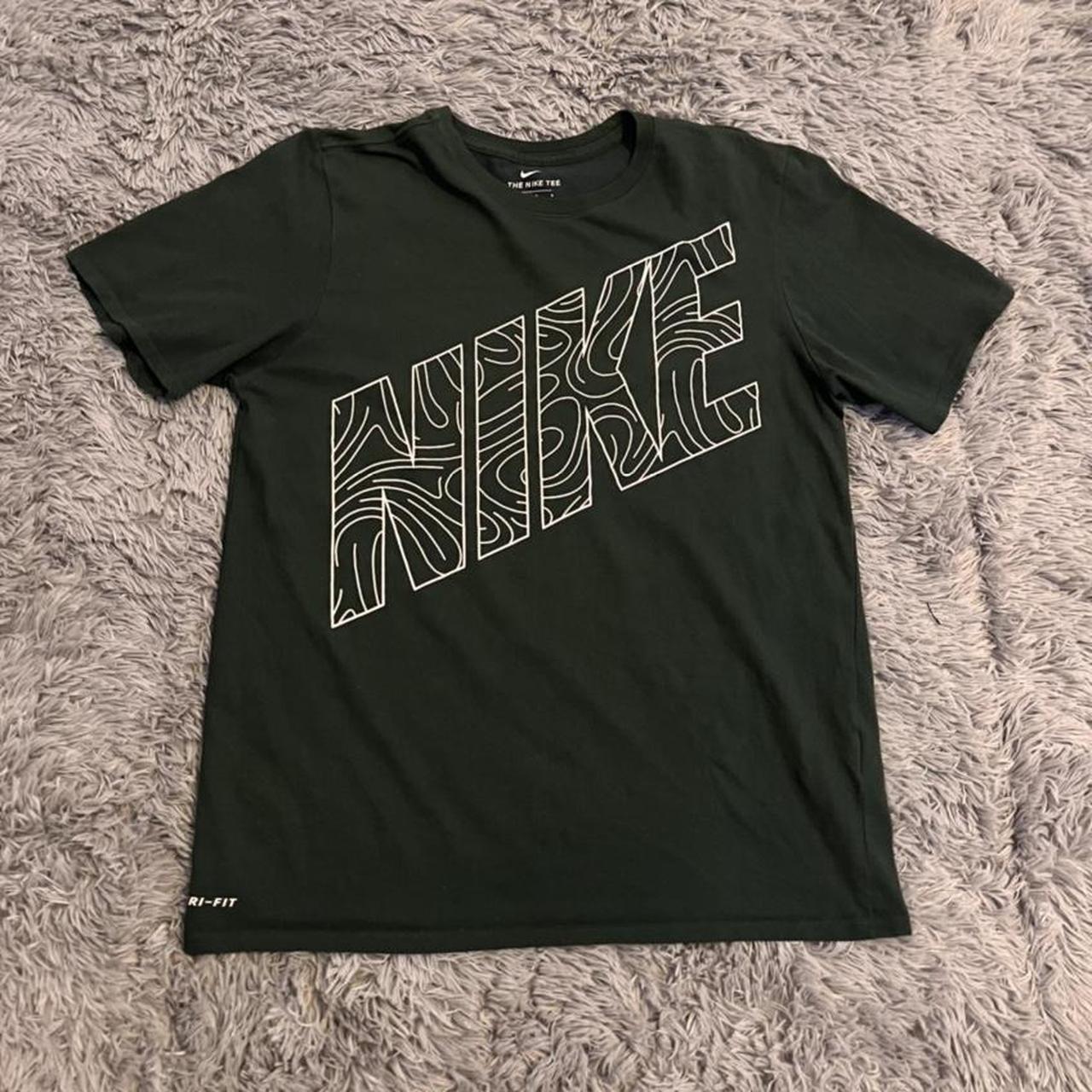 Nike Swirls Tee Has 2 tiny stains on back (as shown... - Depop