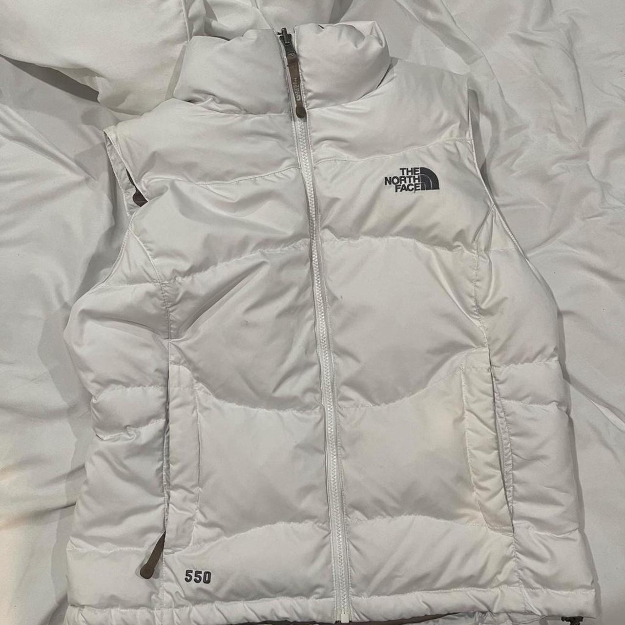 cream north face vest