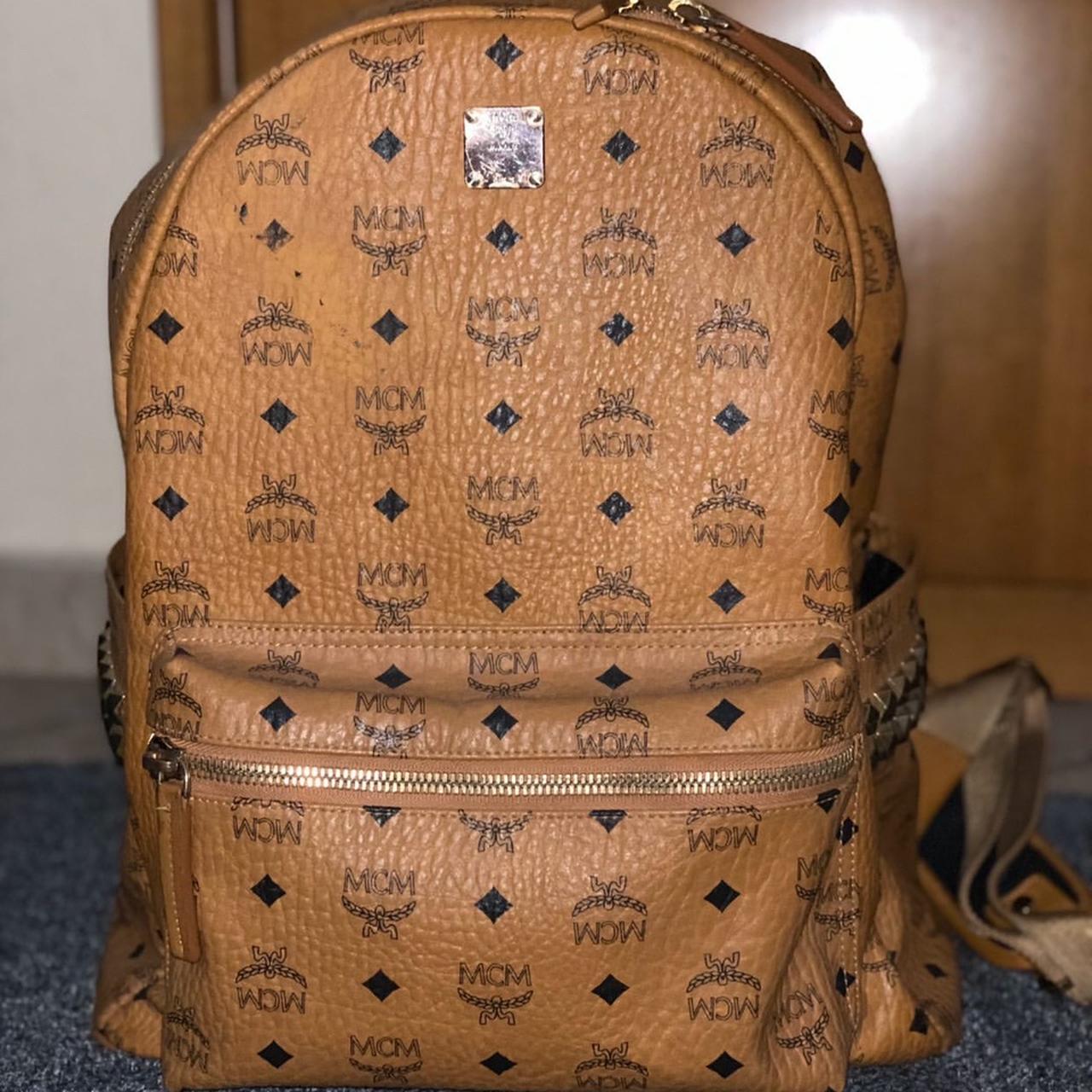 Small, pre-loved, black MCM backpack with minor wear - Depop