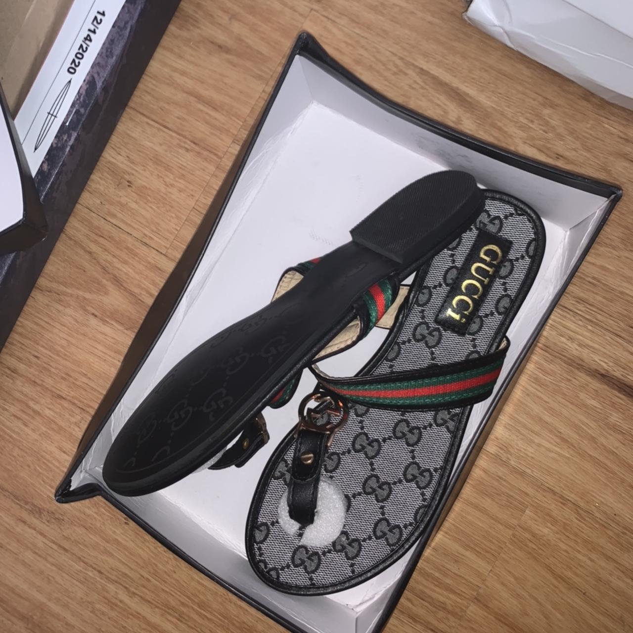 These are Gucci flip flops that have been worn if... - Depop